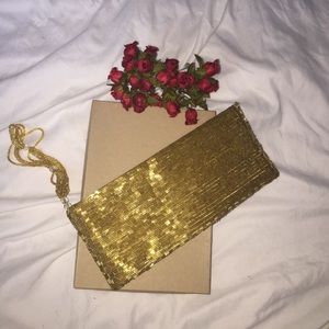 bebe formal gold wristlet